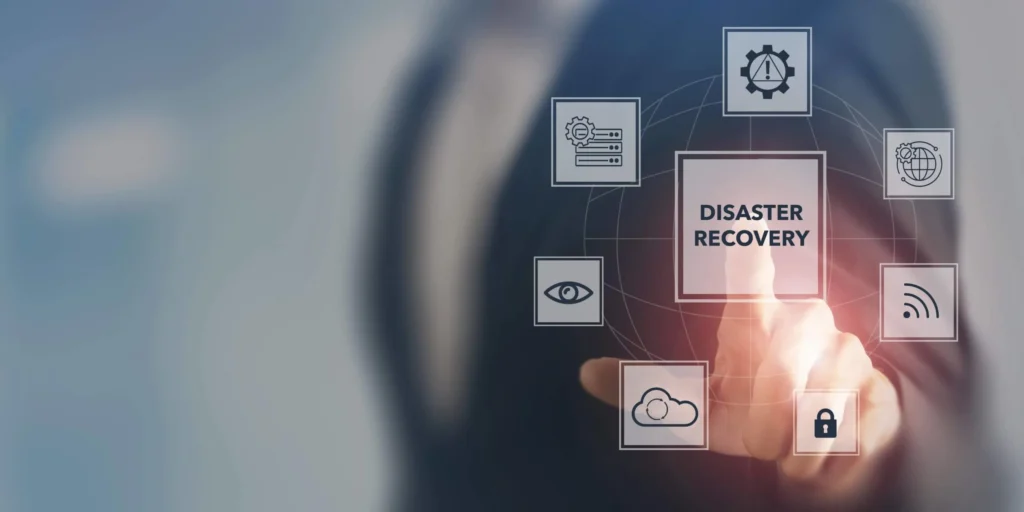 Finger touching "Disaster Recovery" icon, part of comprehensive managed IT services.