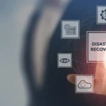 Finger touching "Disaster Recovery" icon, part of comprehensive managed IT services.