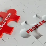 Red puzzle piece labeled "Solution" fitting into "Problem", representing IT consulting.