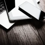 Laptop, tablet, and smartphone, representing comprehensive managed IT services.