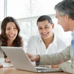 Oswego County business. Managed services with business clients in a modern office setting